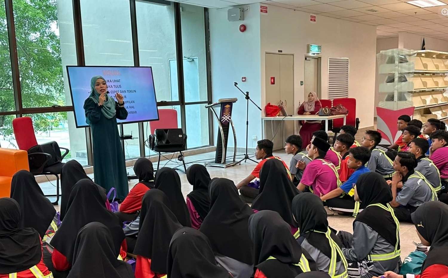 Zuliana coaching young students